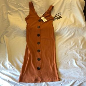 Rust color dress with black buttons